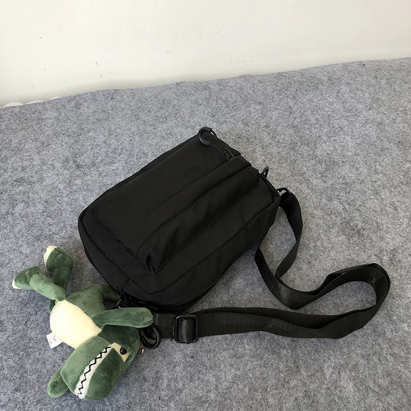 Minimalist Waterproof Crossbody Sling Bag Japanese Streetwear Small Square Shoulder Bag for Men and Women Versatile Urban Messenger Pack