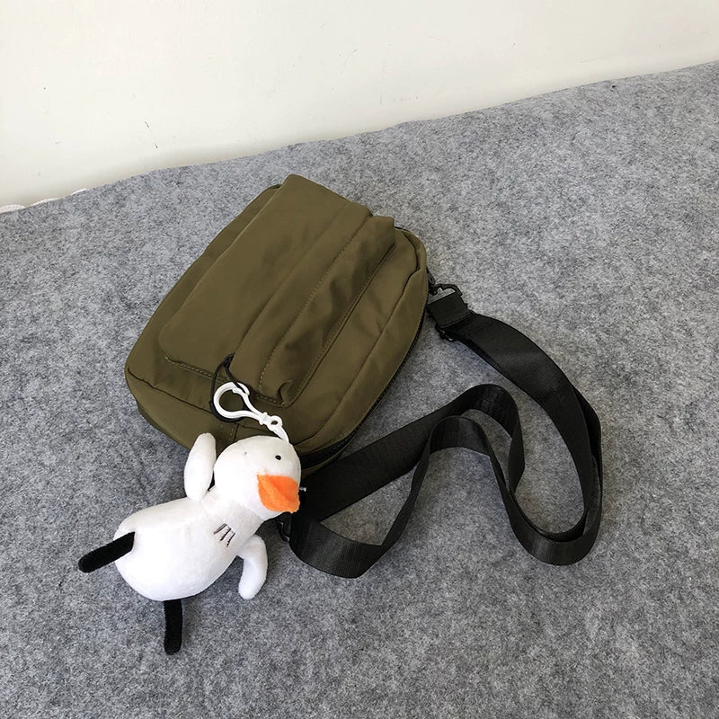 Minimalist Waterproof Crossbody Sling Bag Japanese Streetwear Small Square Shoulder Bag for Men and Women Versatile Urban Messenger Pack